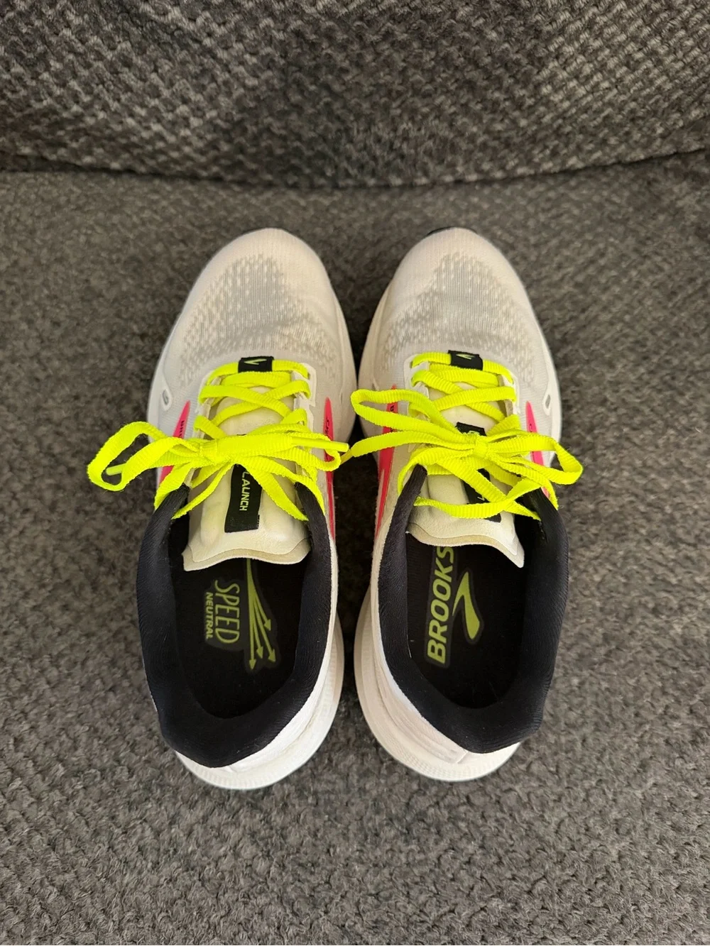 Brooks Women’s White Running Shoes with Neon Yellow Laces and Pink Accent
